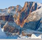 Icebergs in front of Appat Island-frozen into the sea ice of the Uummannaq fjord system during wint Art Print